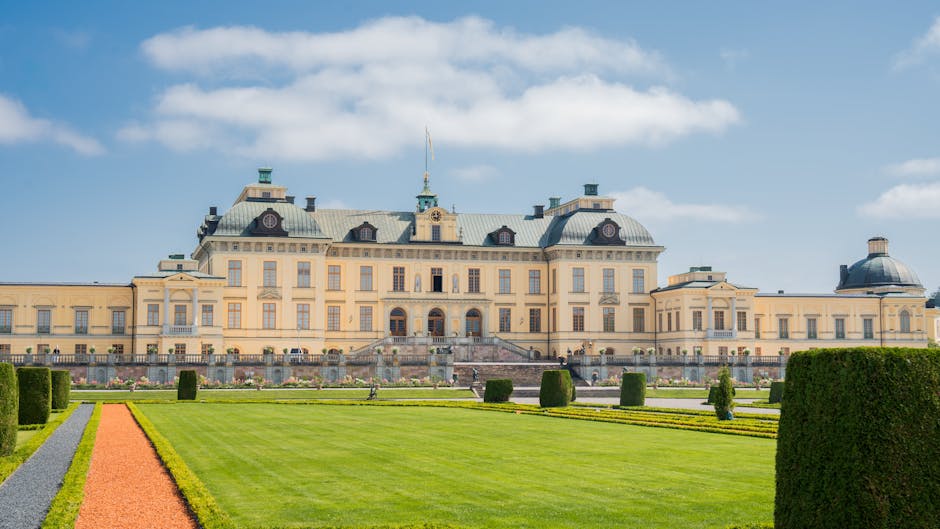 Drottningholm Palace with manicured gardens in Stockholm, Sweden.